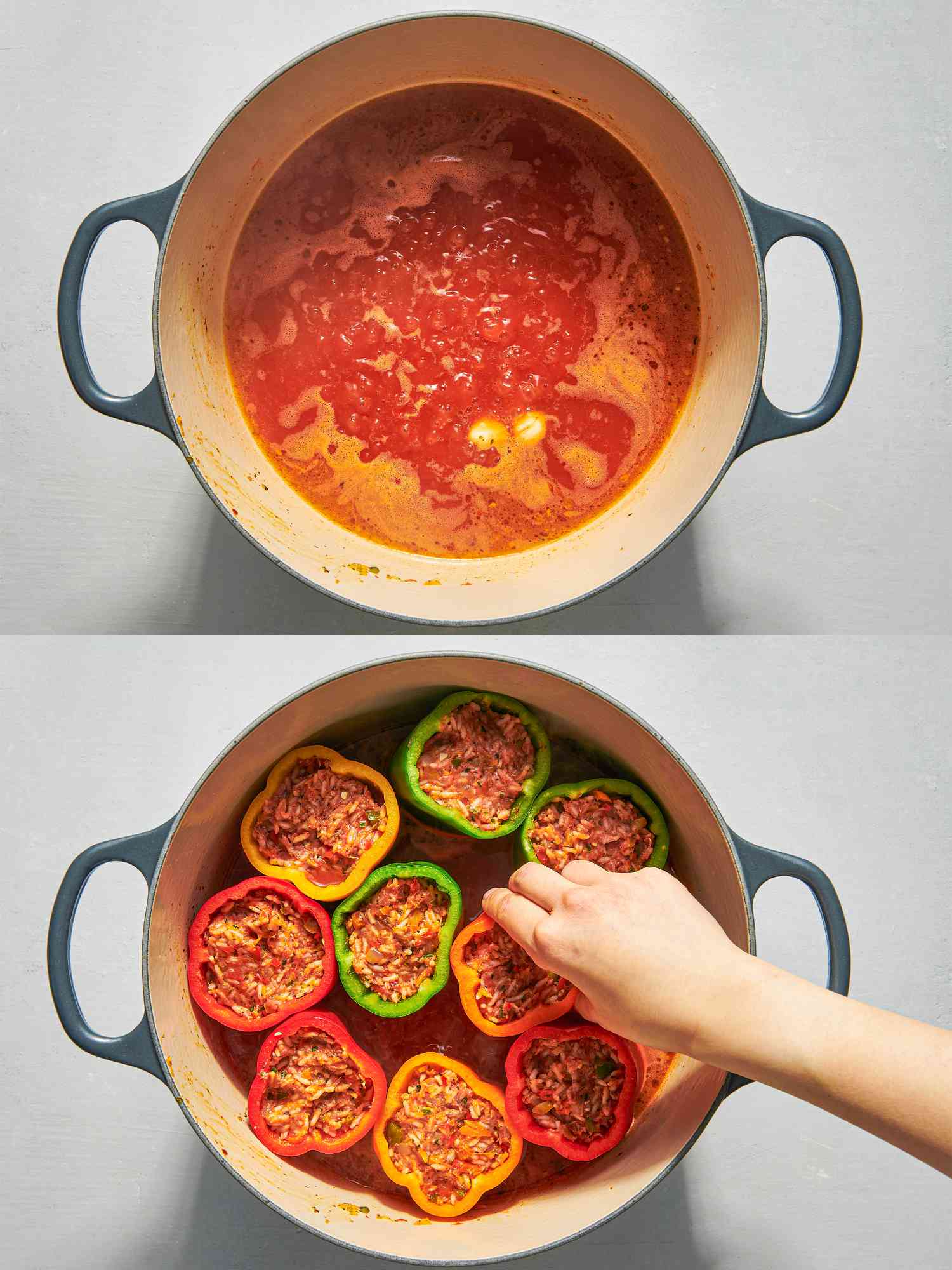 Overhead view of braising liquid and placing peppers in pot