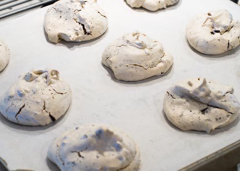 Baked meringue on a baking tray. 