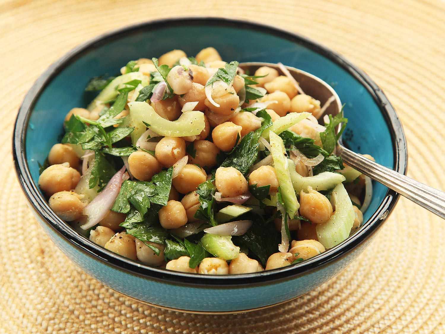 Chickpea, cucumber, and cumin salad in a bowl.