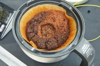 The coffee grounds left in the Breville Precision Brewer Thermal Coffee Maker