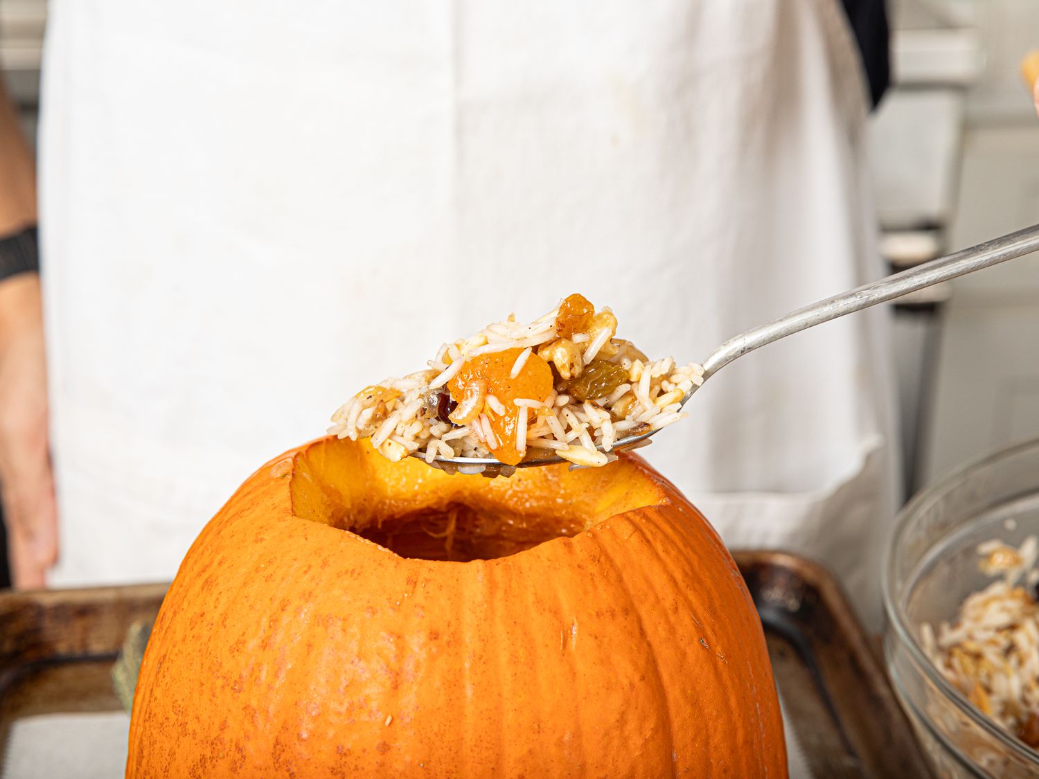 Side view of adding filling to ghapama