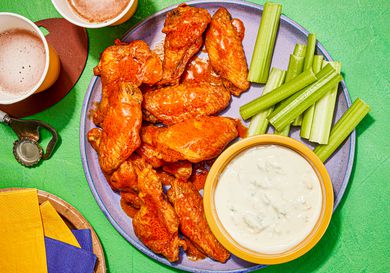 Overhead view of air fryer Buffalo Wings