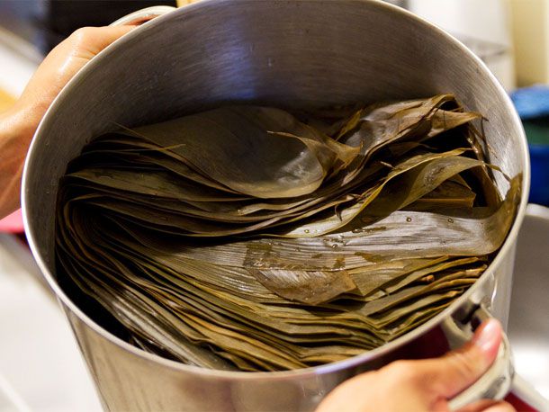 Joong leaves after being cooked in large stockpot.
