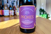 A bottle of Proxies Red Ember na wine
