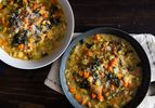 Overhead view of two bowls filled with ribollita soup.