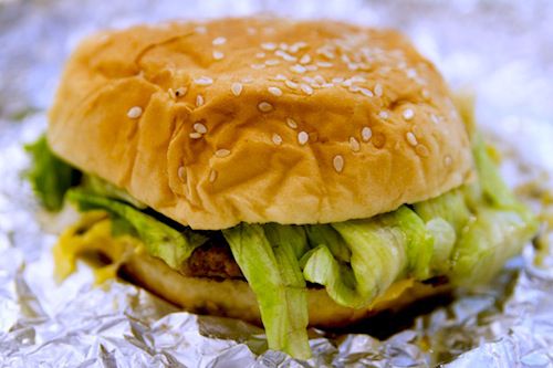 Closeup of a burger from Five Guys.