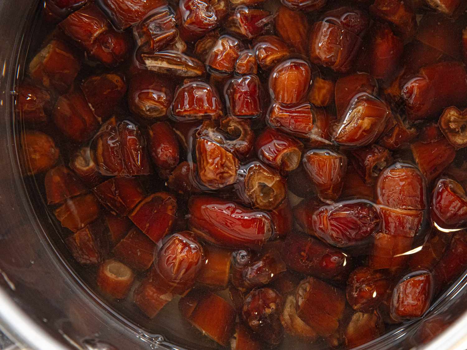 Overhead view of dates in water
