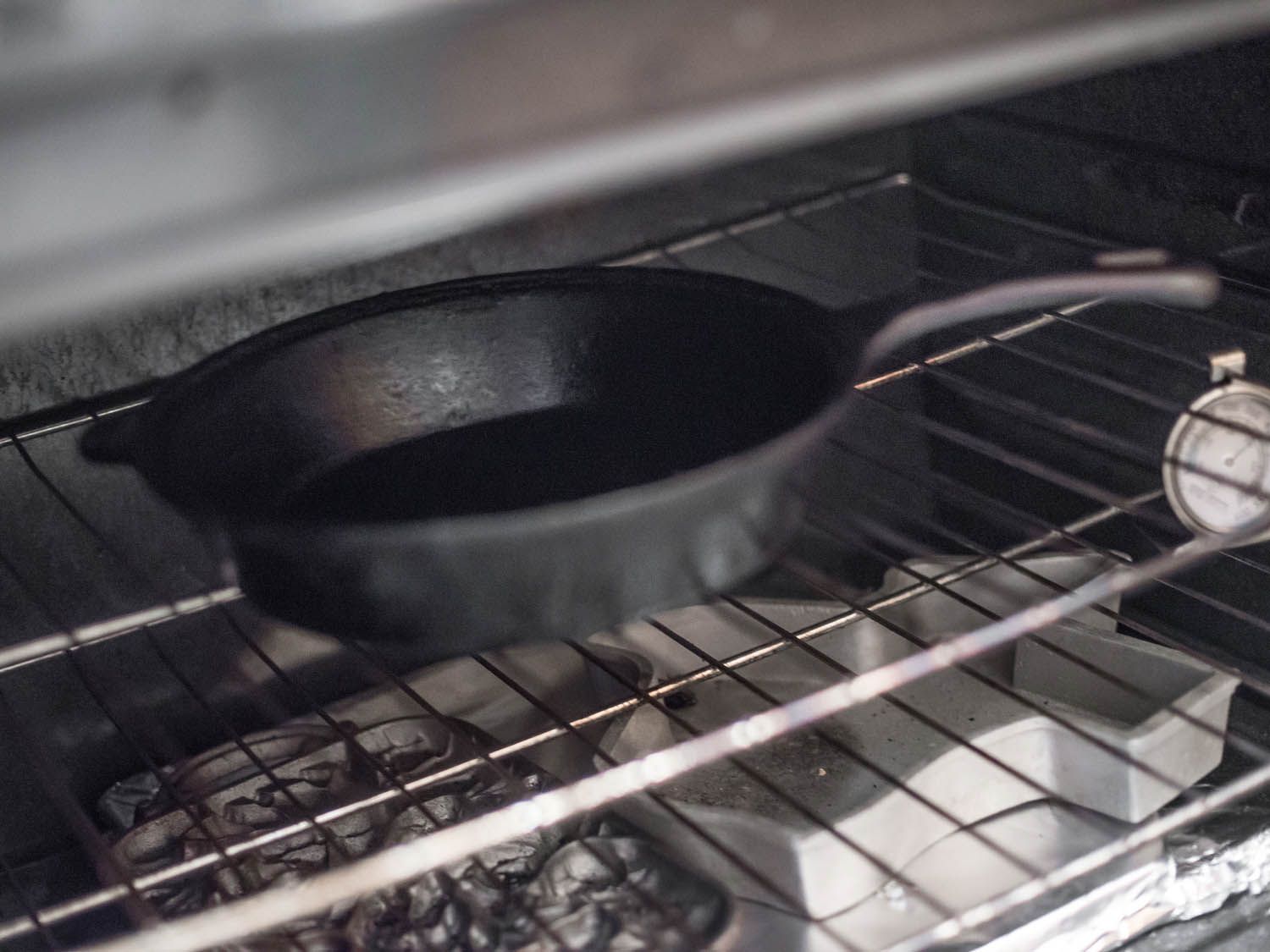 Preheating a cast iron skillet in the oven for cornbread.