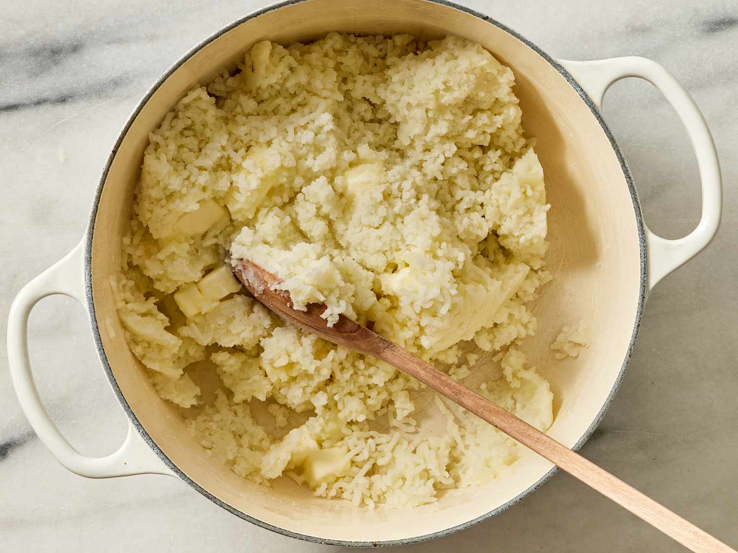 Overhead view of butter being folded in 