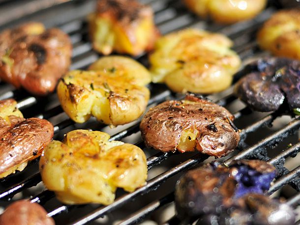 Smashed potatoes on the grill.