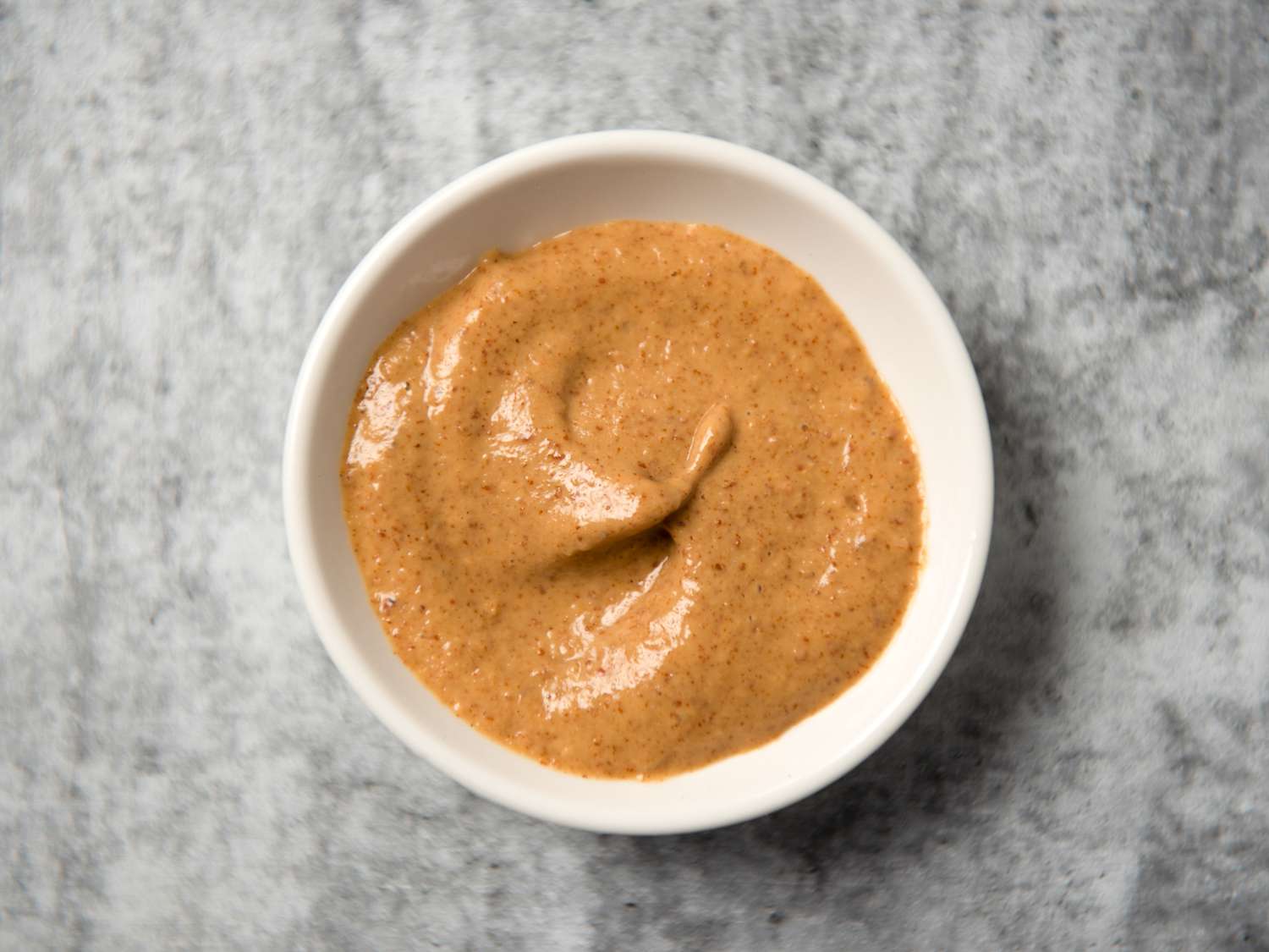 beer mustard in a small white bowl