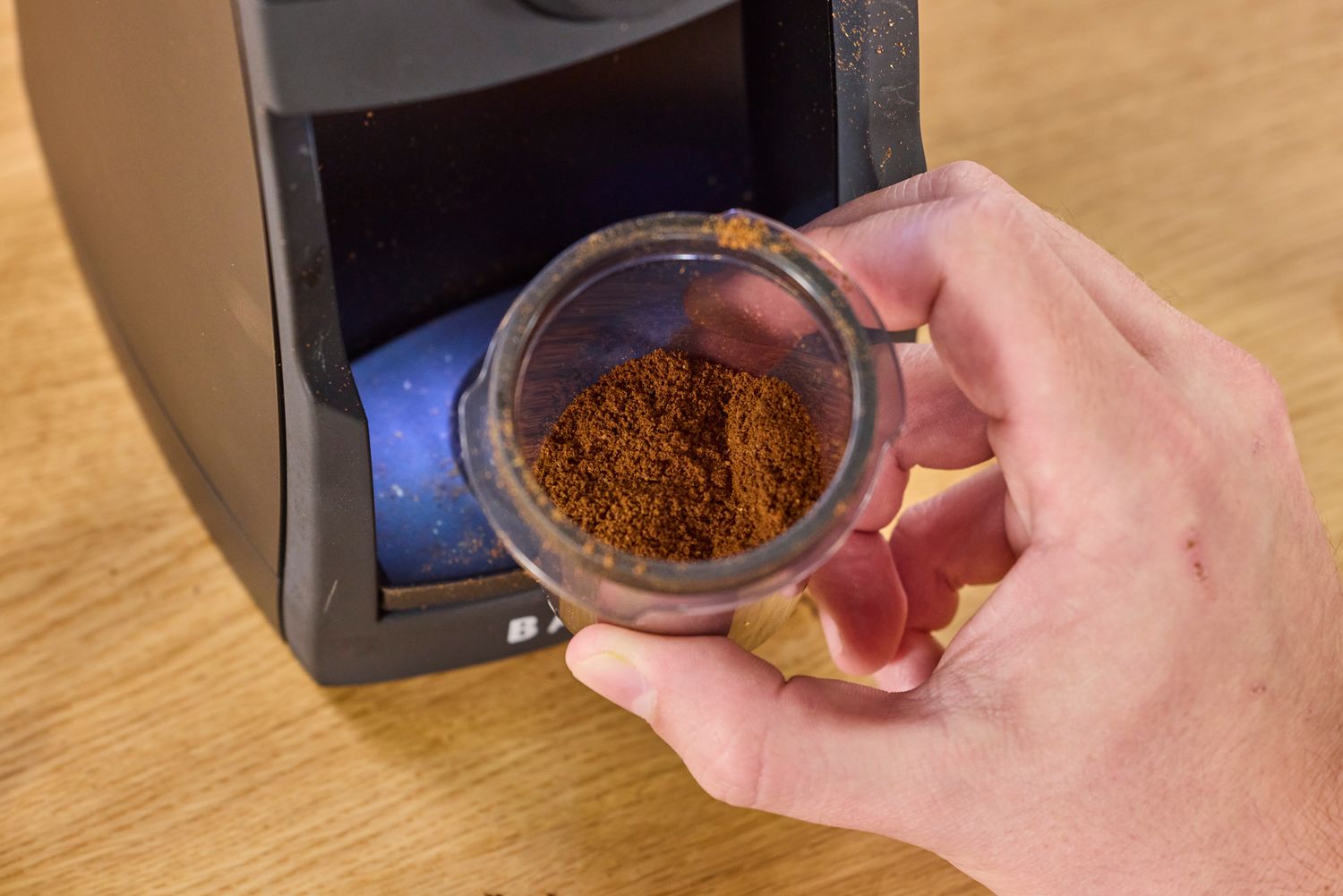 A cup of ground coffee made in the Baratza Encore ESP Pro Coffee Grinder