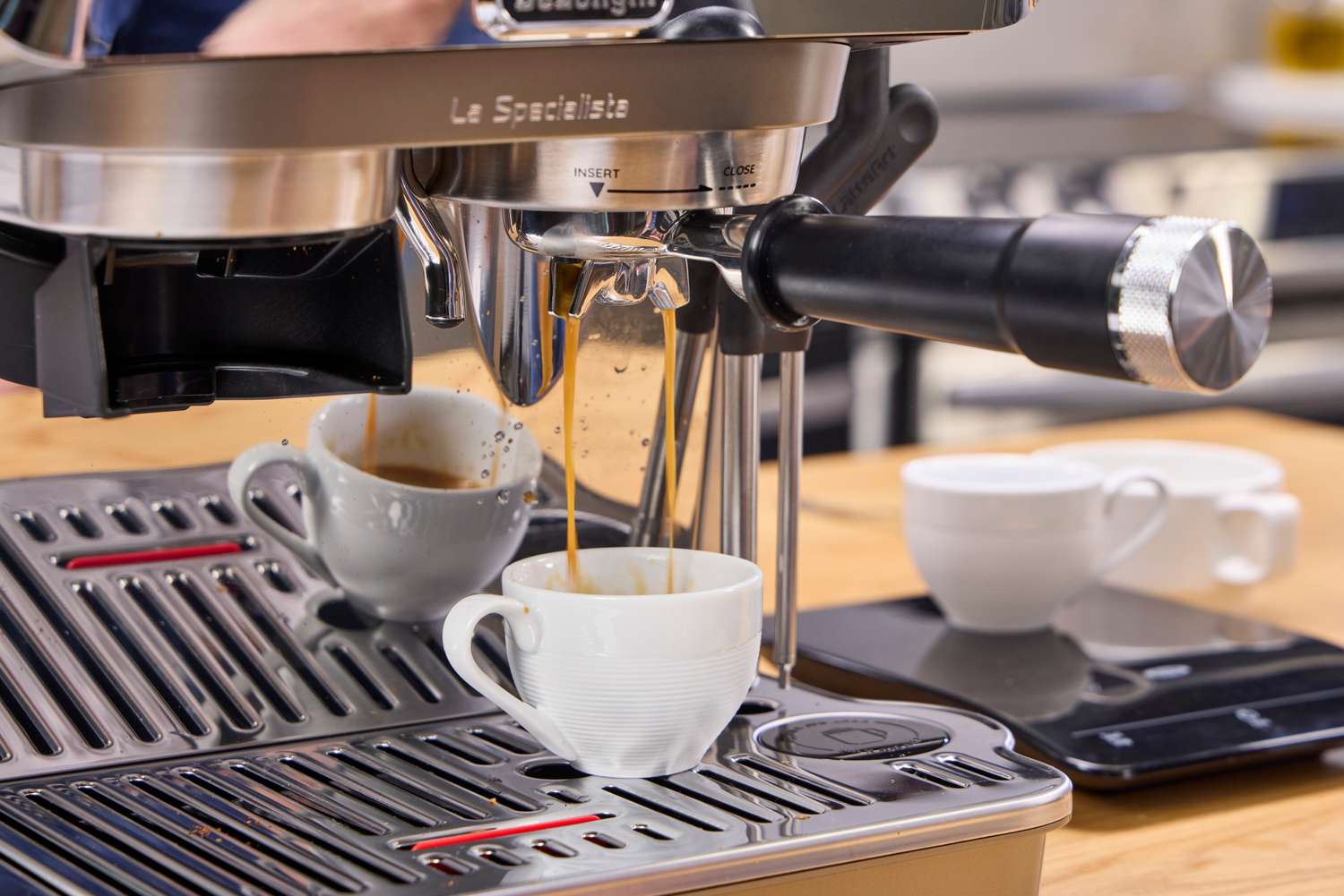 Espresso pours from the De'Longhi La Specialista Touch Espresso Machine