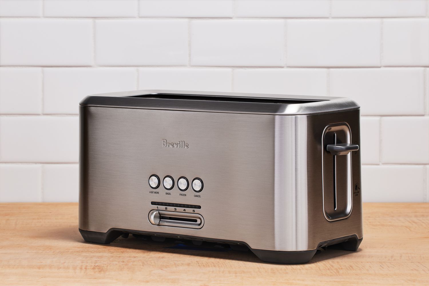 Breville BTA720XL A Bit More 2 Slice Toaster on wooden counter