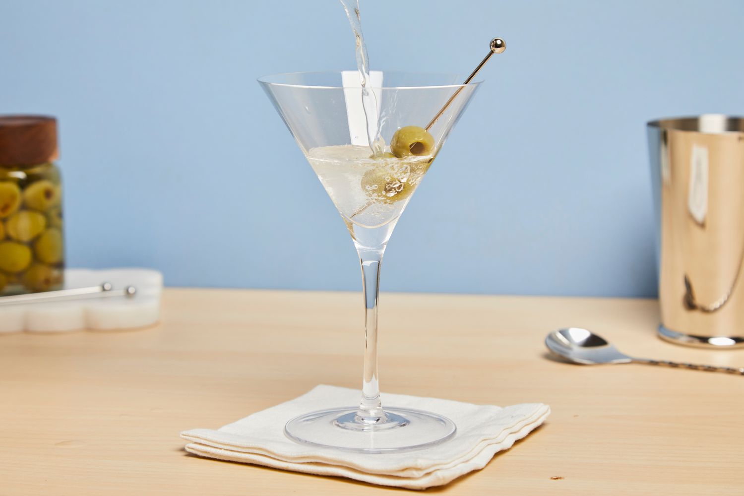 Liquid being poured into Williams Sonoma Reserve Martini Glasses