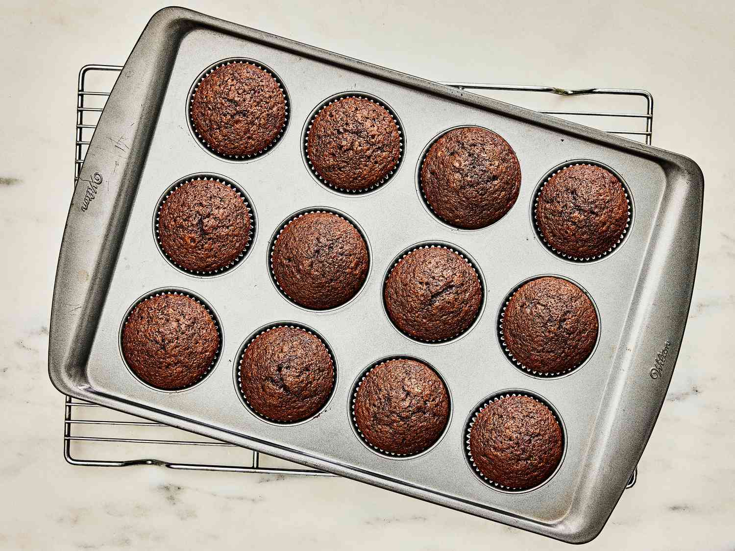 Baked cupcakes on cooling rack 