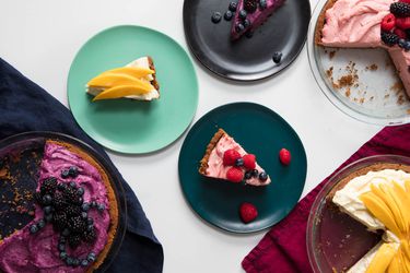 table full of cheesecakes