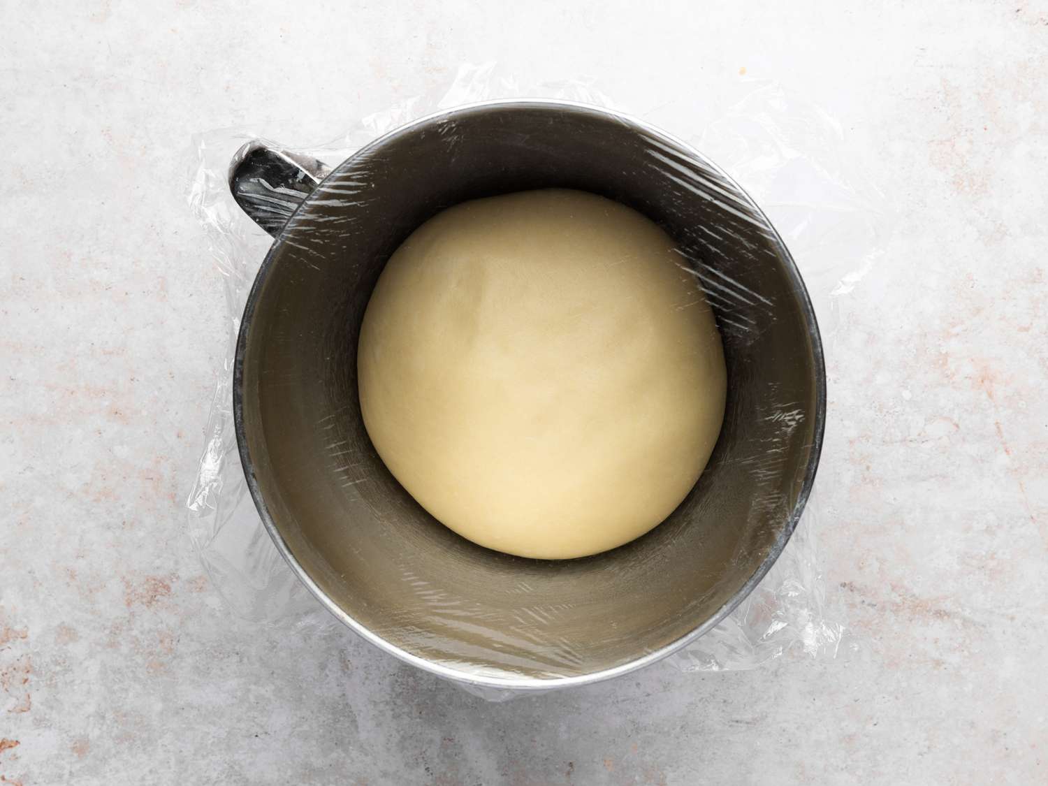 Dough risen until puffy, light, and doubled in bulk 