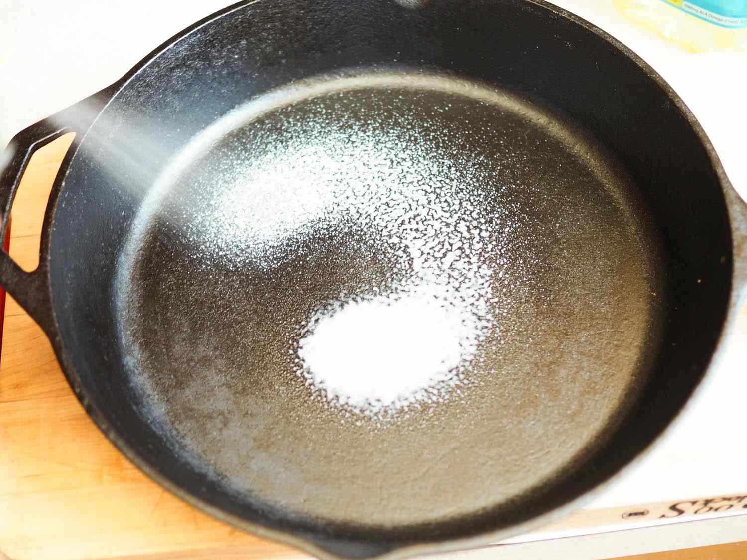 The skillet is coated with cooking spray.