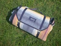 nemo blanket folded up on a lawn