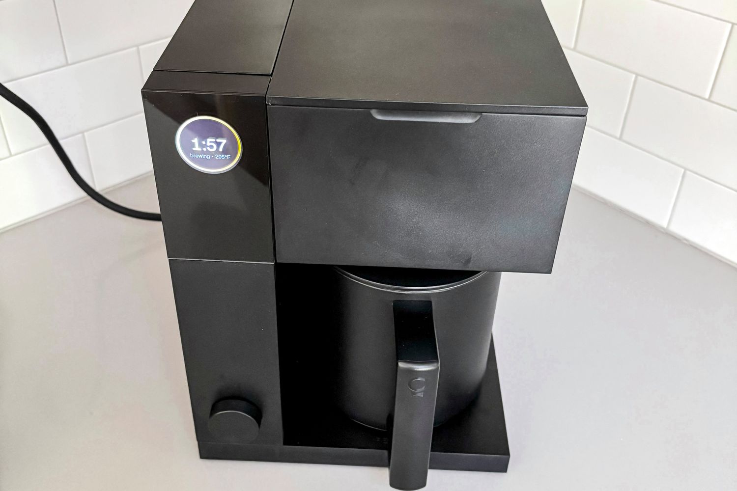 The Fellow Aiden brewing coffee.