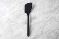 The GIR Premium Silicone Mini Flipper on a marbled surface