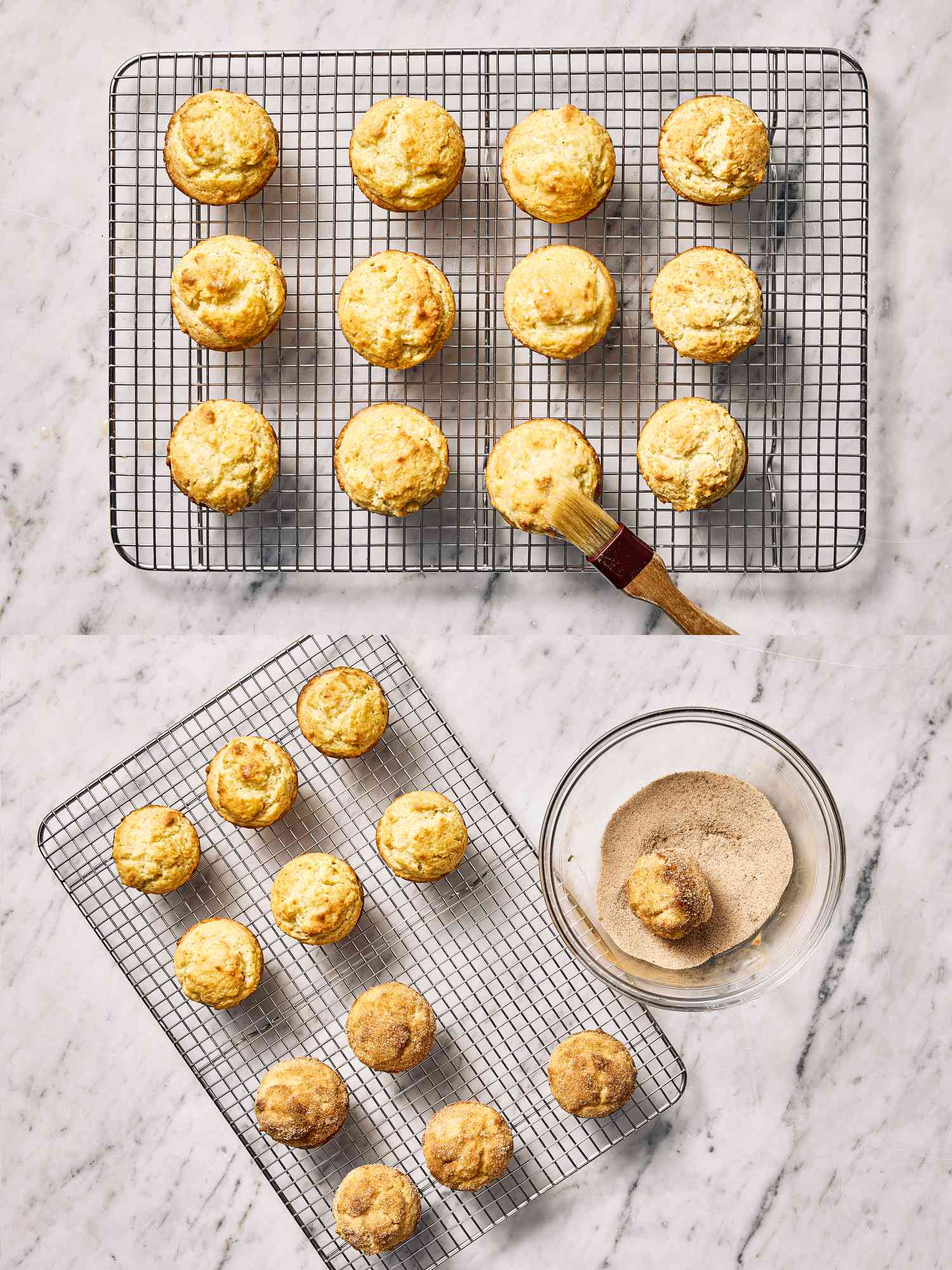 A cooling rack with doughnut muffins, another rack below, a bowl of cinnamon sugar, and a brush for glazing are shown