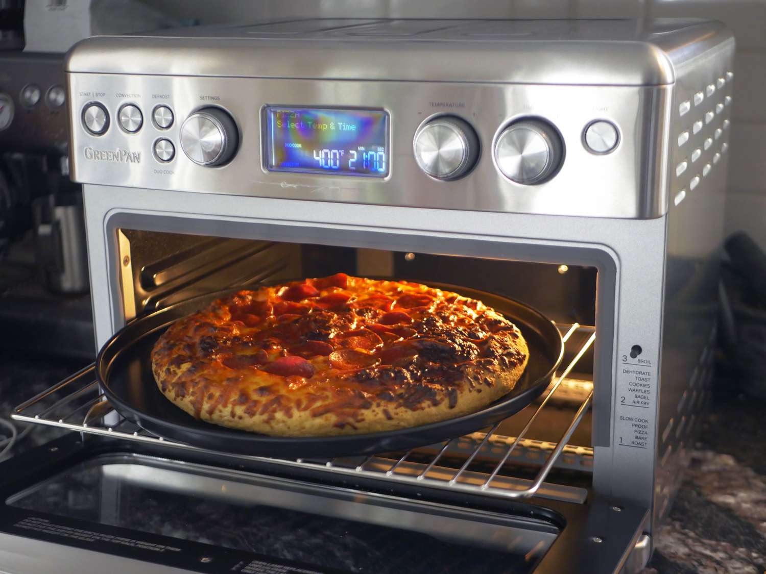 frozen pizza cooking in greenpan toaster oven 