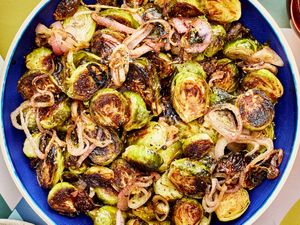Roasted Brussels sprouts and shallots with a balsamic glaze in a bowl