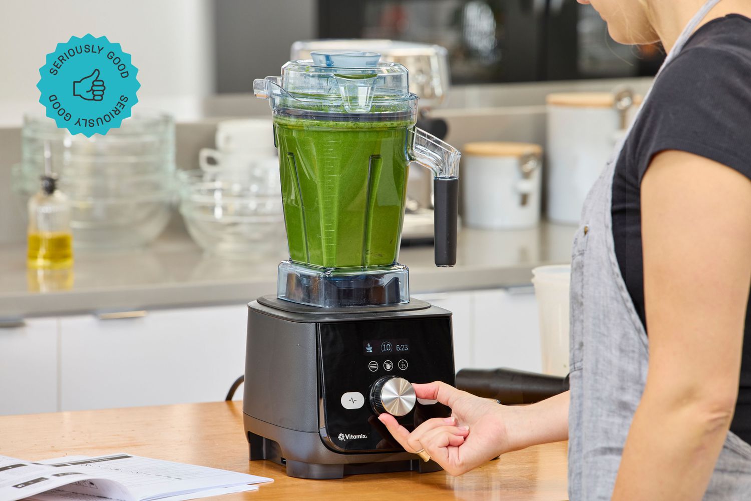 A person blending soup in the Vitamix Ascent X5 blender