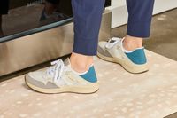 A person stands on The House of Noa Nama Standing Mat