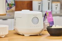 The Cuckoo 6-Cup Micom Rice Cooker on a kitchen countertop