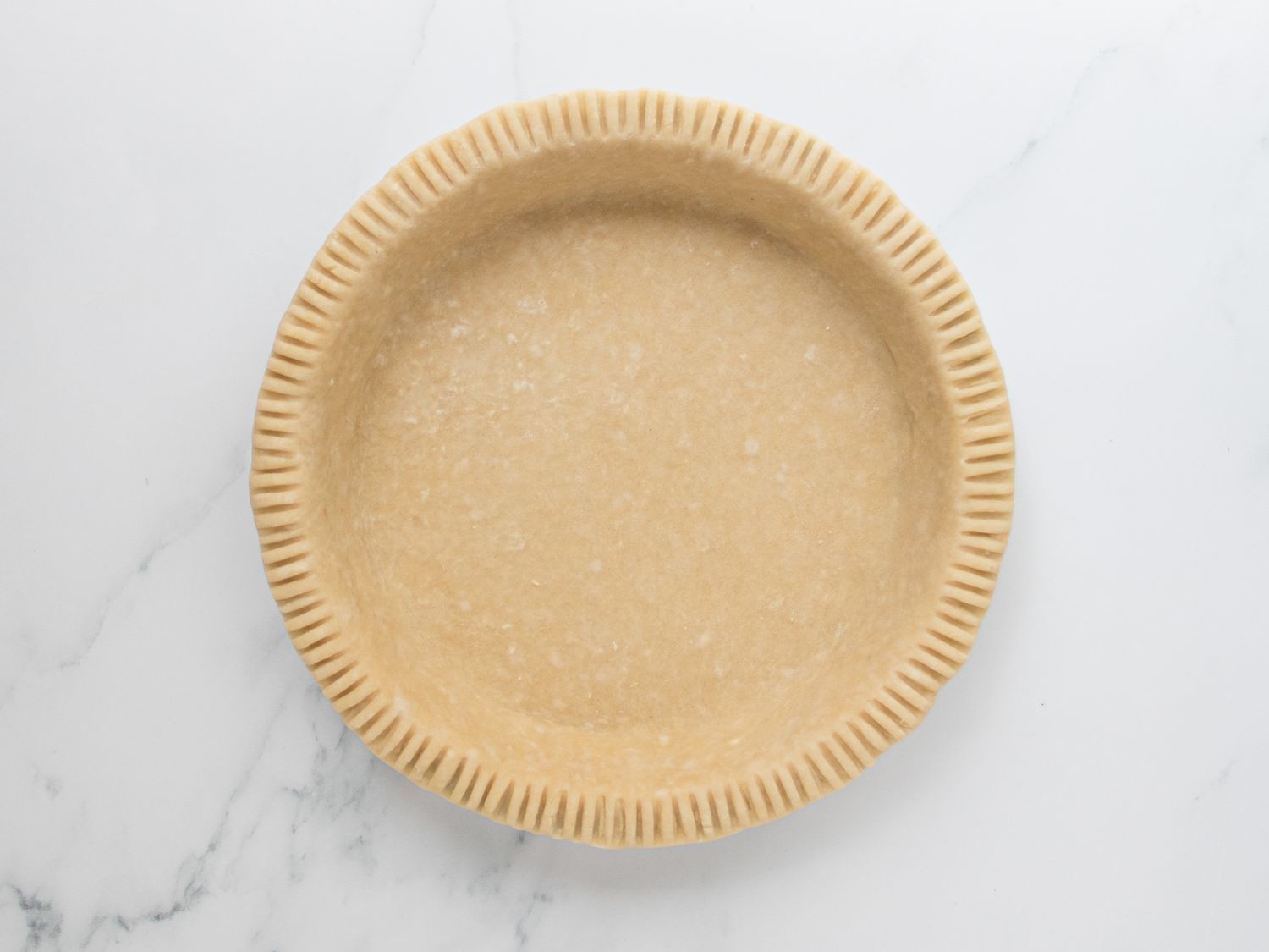 Overhead view of frozen pie crust
