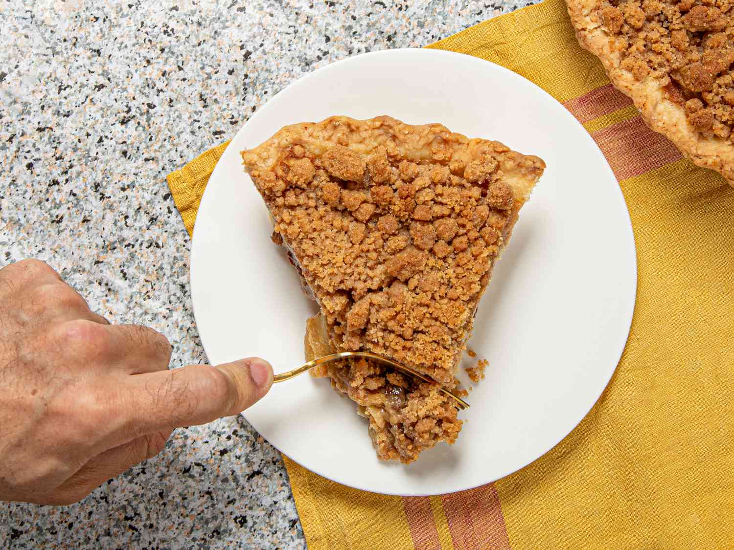 Overhead view of eating a slice of pie