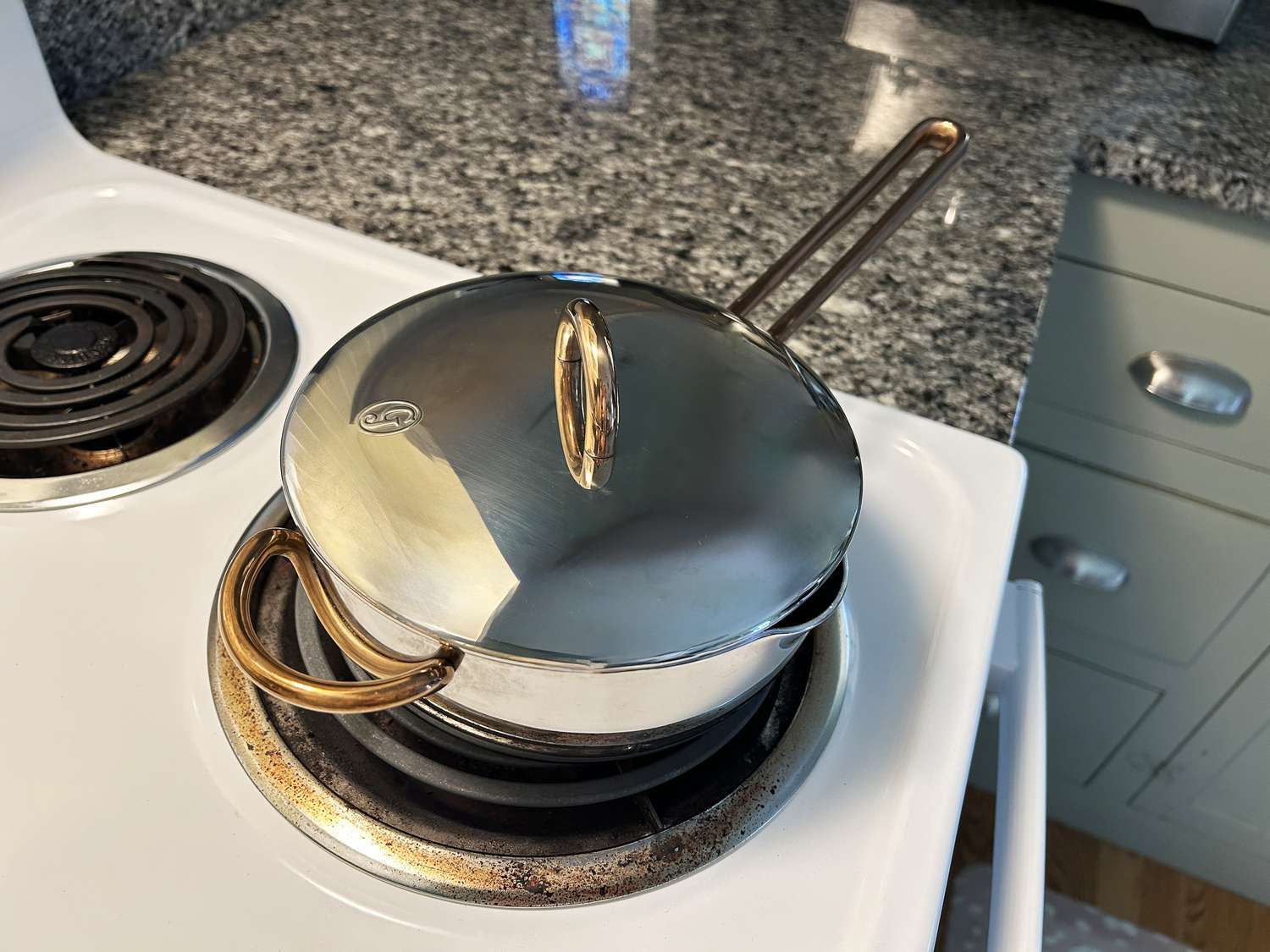 An overhead view of the Great Jones Little Saucy saucier with the lid on