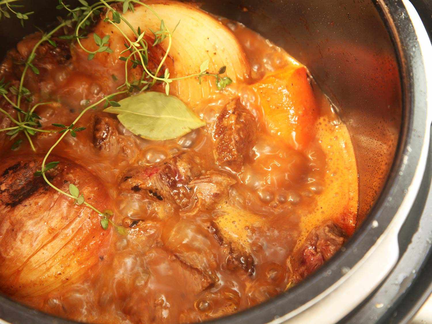 Beef stew in a pressure cooker. 