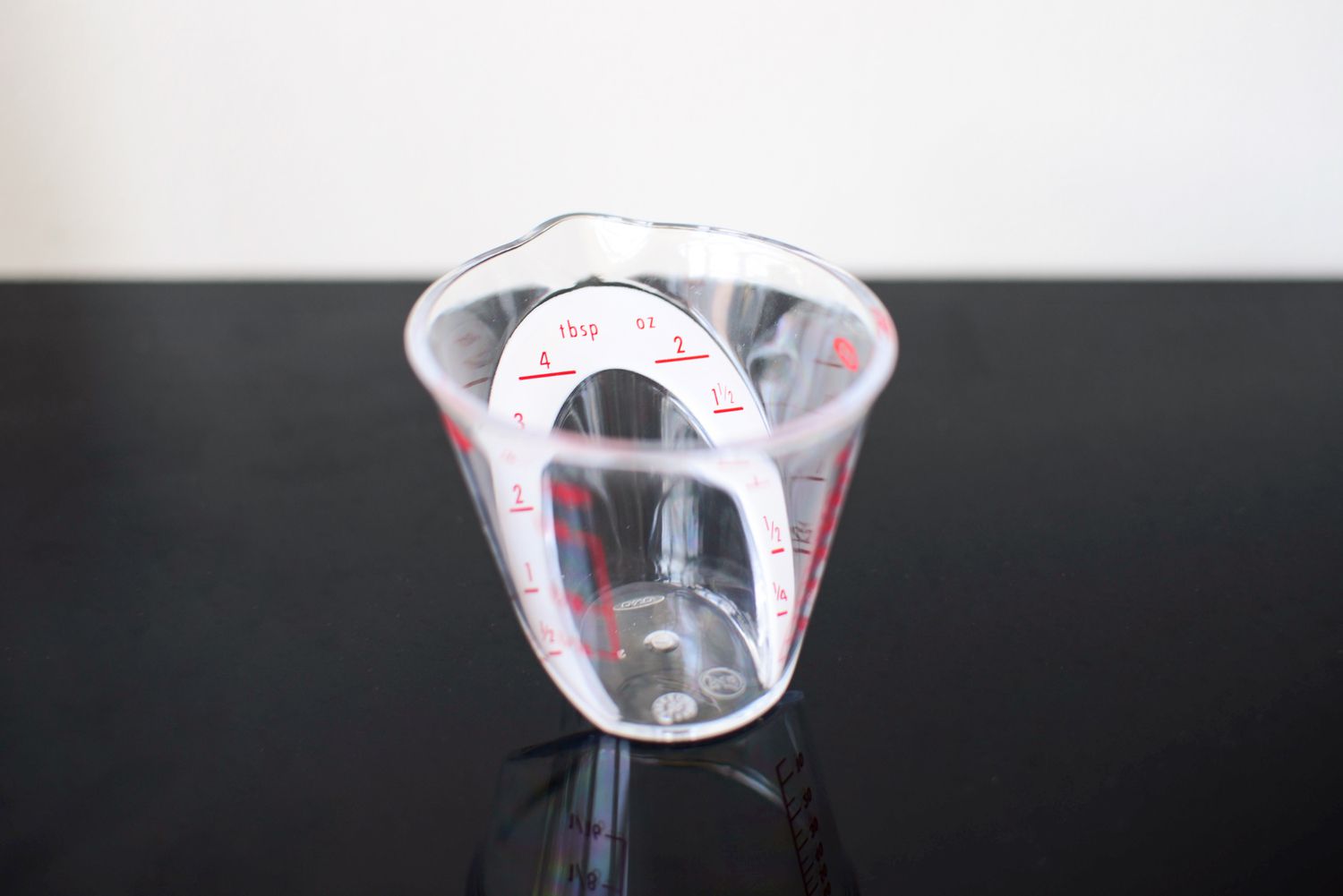 a small plastic on black countertop 