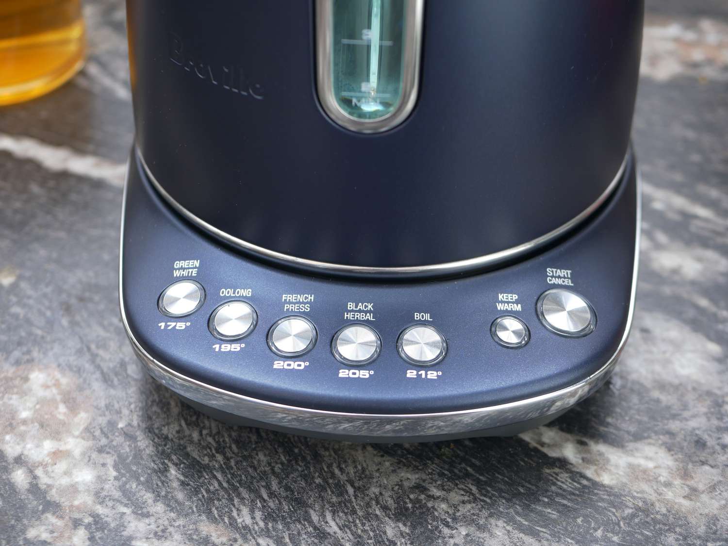 a closeup of the seven buttons on the breville variable kettle