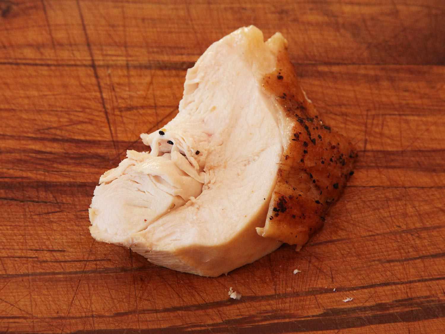 Sample piece of sous vide chicken breast cooked to 150 degrees Fahrenheit--it's starting to get a little stringy.