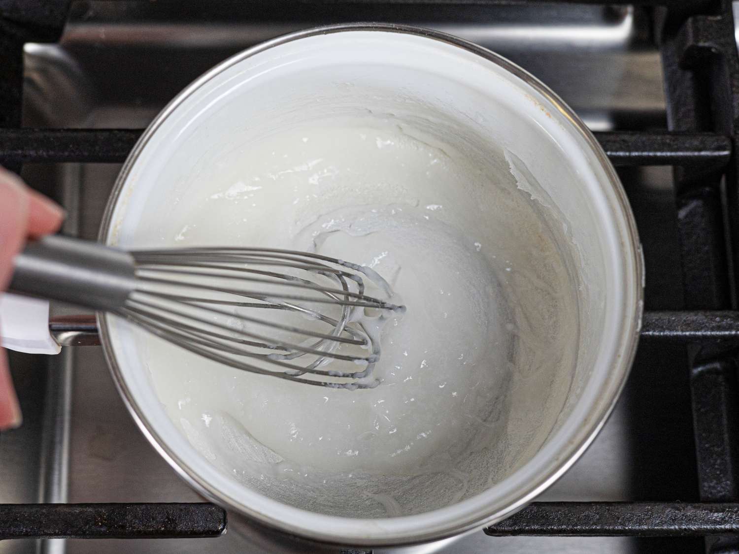 Overhead view of whisking puto batter