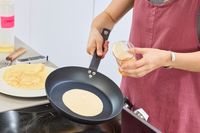 Crepes are made in the Merten & Storck Pre-Seasoned 10-inch Carbon Steel Frying Pan