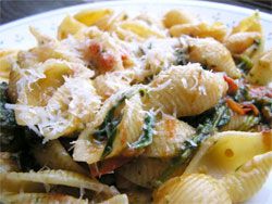 Closeup of Pasta with Arugula and Tomatoes.