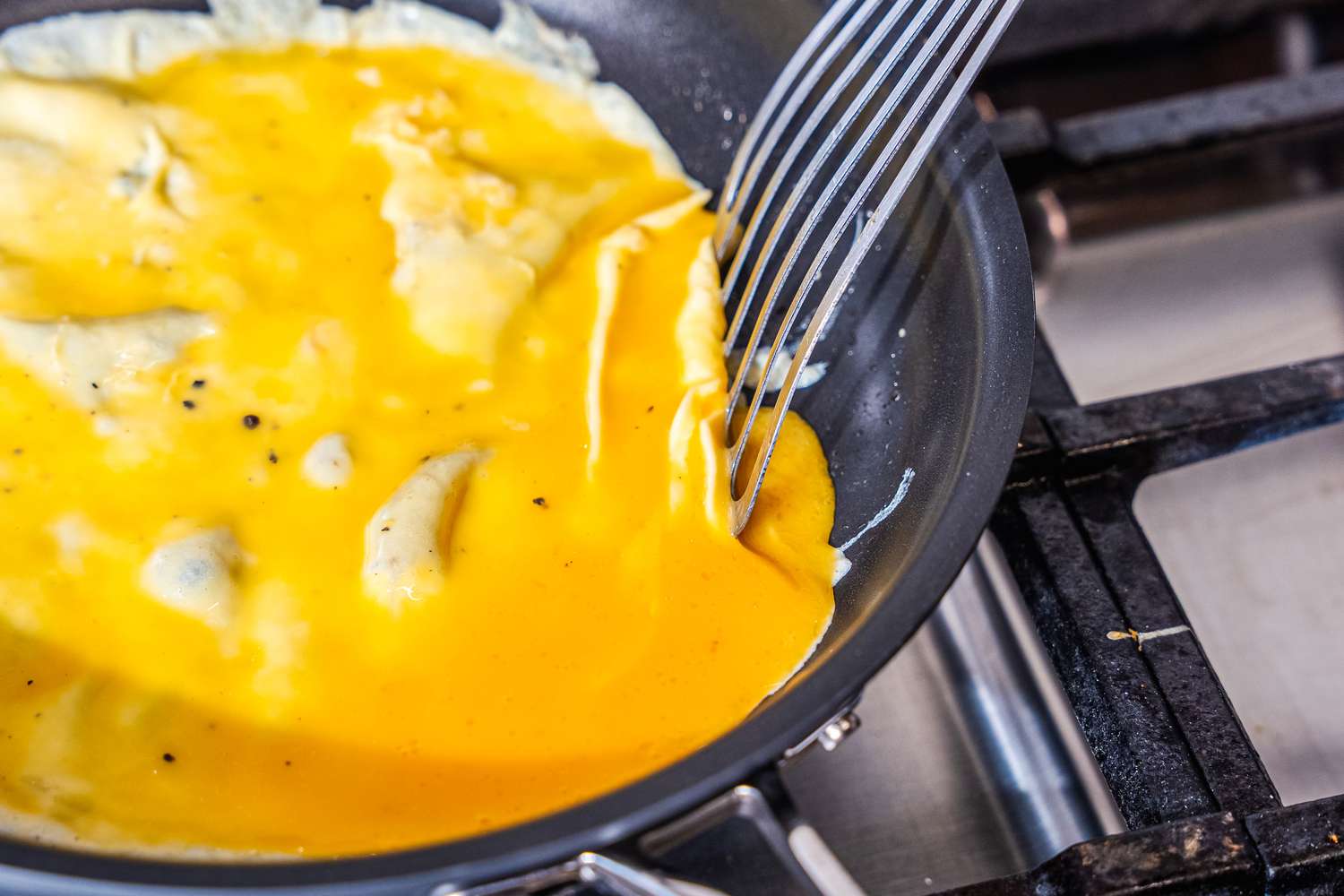 Eggs cooking in the Cuisinart 622-24 Chef’s Classic Nonstick Skillet