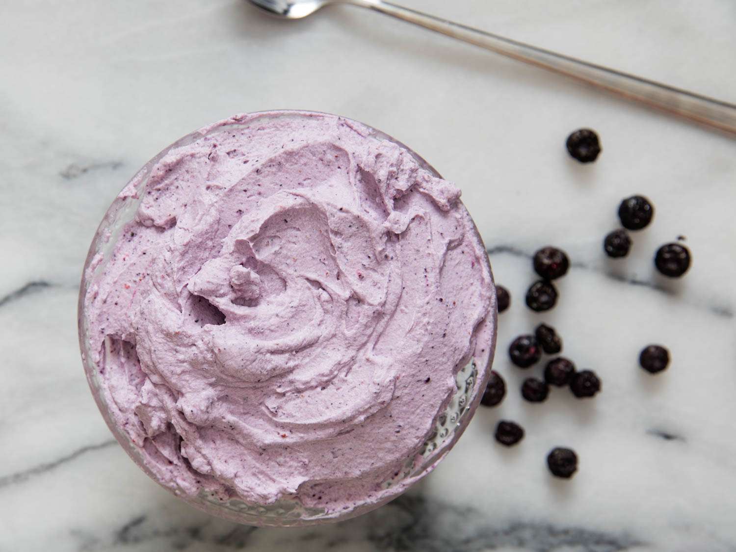 Overhead shot of blueberry whipped cream with freeze-dried blueberries.