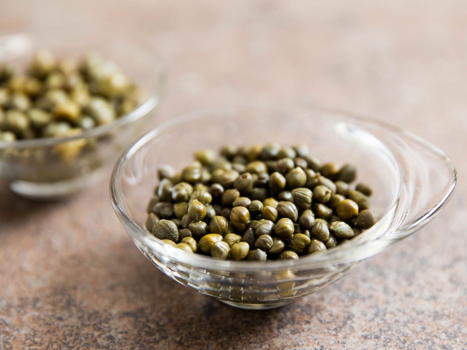A small bowl of capers. 