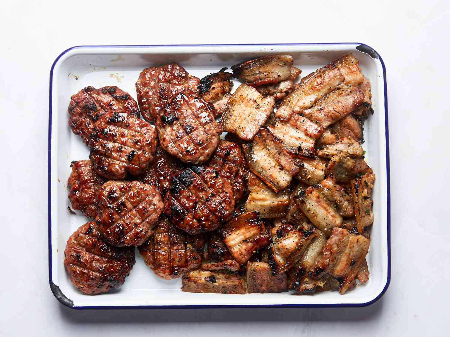 Overhead view of grilled pork paste and pork belly