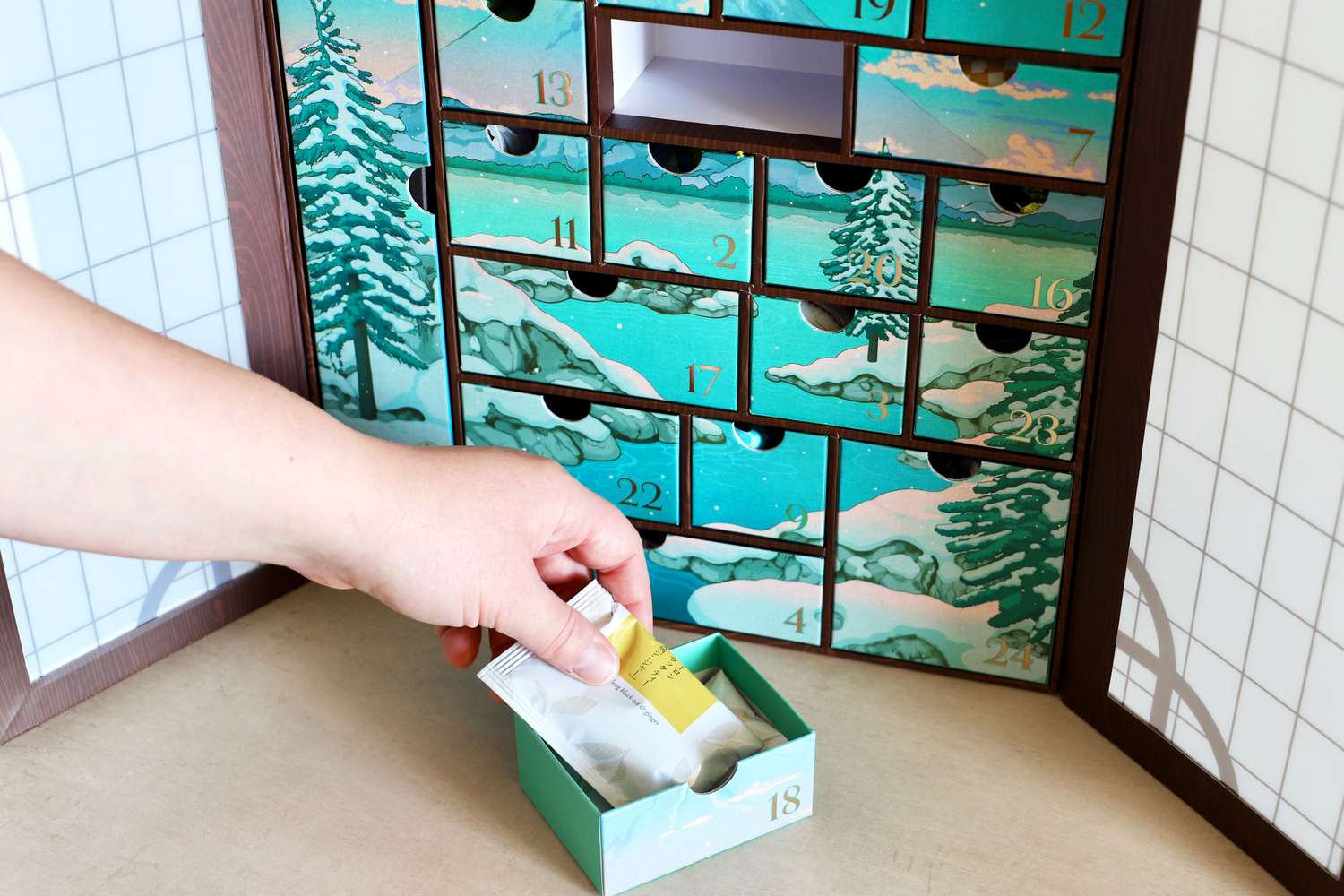 the Bokksu Advent Calendar with a drawer pulled out showing Japanese tea