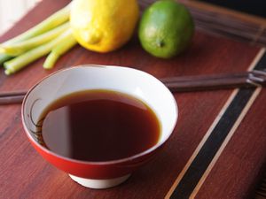 A small dish of ponzu sauce. 