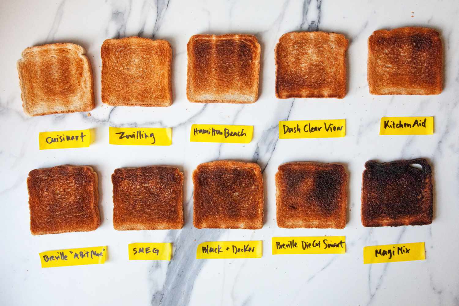 Ten slices of bread, toasted to various degrees of doneness.