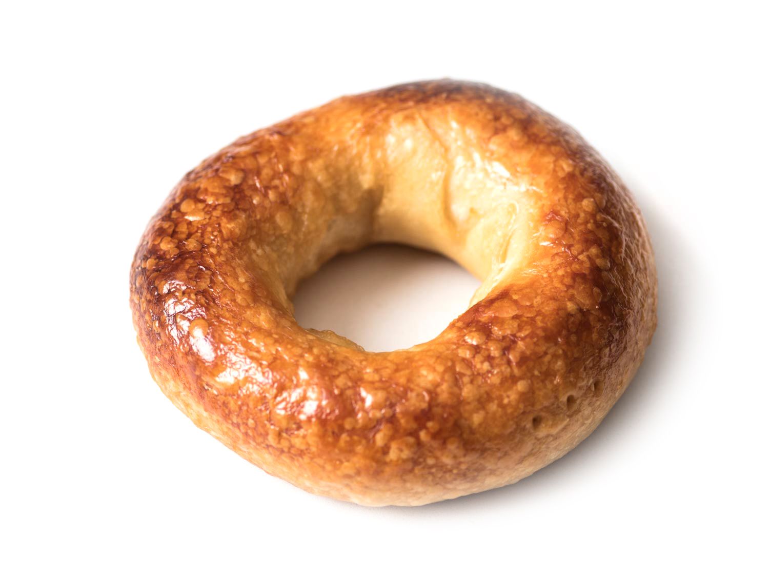 A dense bagel that hasn't risen properly due to overmixing.